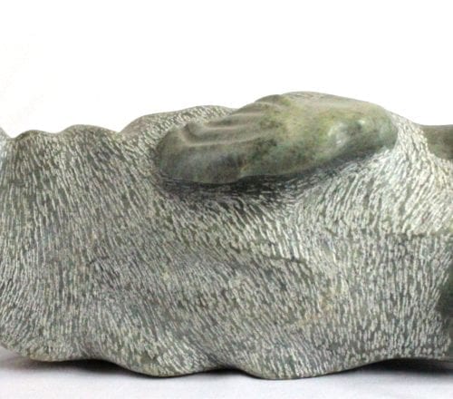 Inuit carving Of Walrus by Donnie Pitsiulak