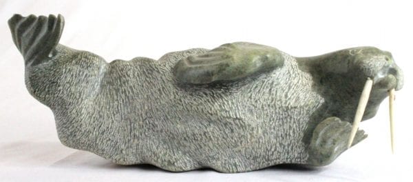 Inuit carving Of Walrus by Donnie Pitsiulak
