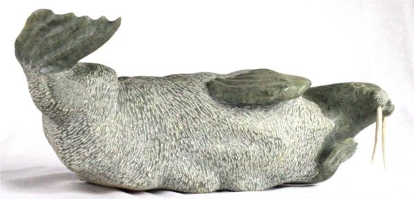 Inuit carving Of Walrus by Donnie Pitsiulak