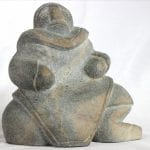 Inuit carving of woman by Thomas Akilak