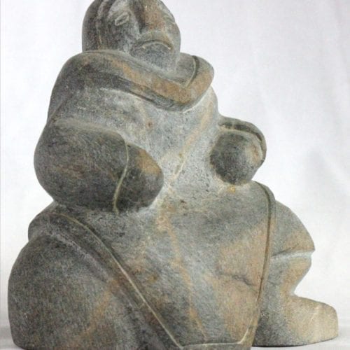 Inuit carving of woman by Thomas Akilak