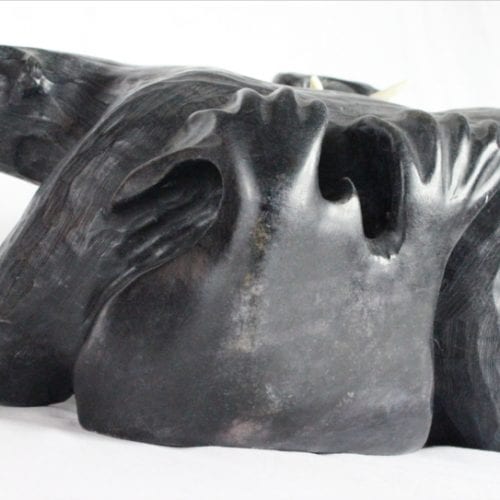 Inuit carving of walrus and bear by Mark Tertiluk