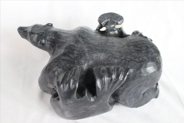 Inuit carving of walrus and bear by Mark Tertiluk