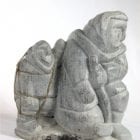 Inuit carving of giant and man by Aisa Amittuk