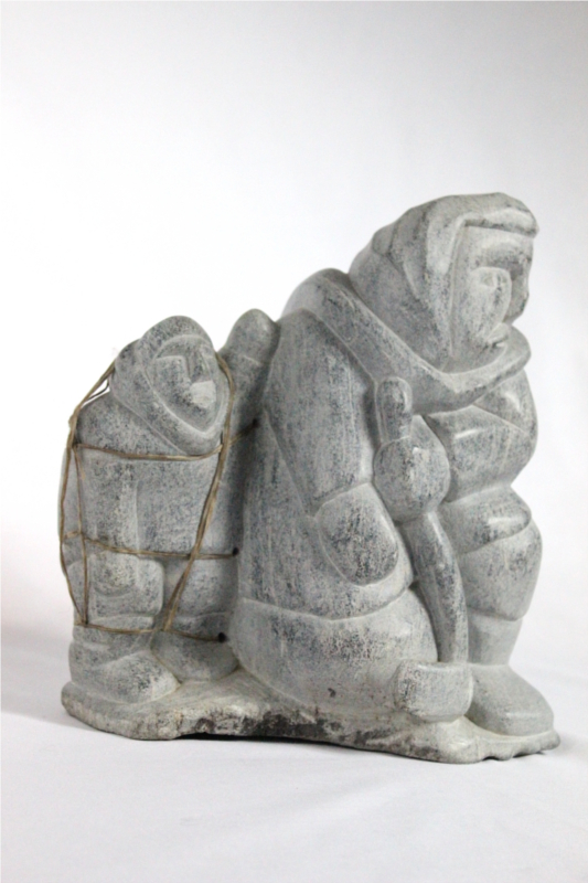 Inuit carving of giant and man by Aisa Amittuk