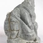 Inuit carving of giant and man by Aisa Amittuk