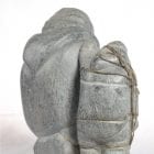 Inuit carving of giant and man by Aisa Amittuk