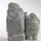 Inuit carving of giant and man by Aisa Amittuk