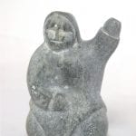 Inuit carving of Inuk by Toona Iqulik
