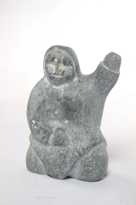 Inuit carving of Inuk by Toona Iqulik