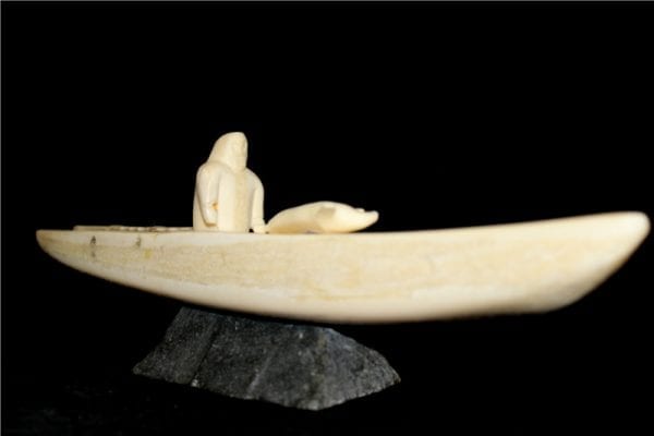 Inuit Carving of Hunter and Kayak in Ivory