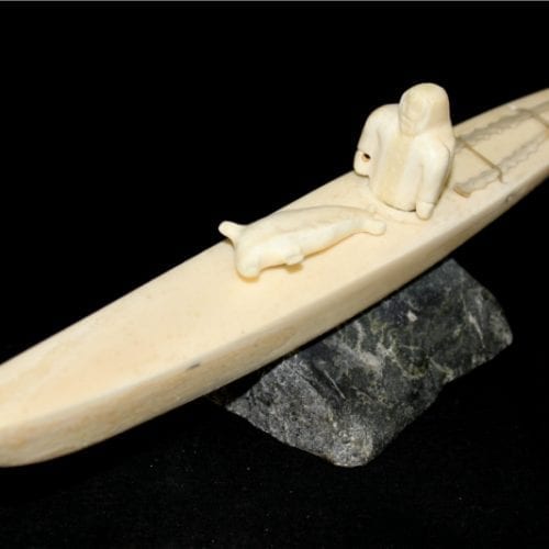 Inuit Carving of Hunter and Kayak in Ivory