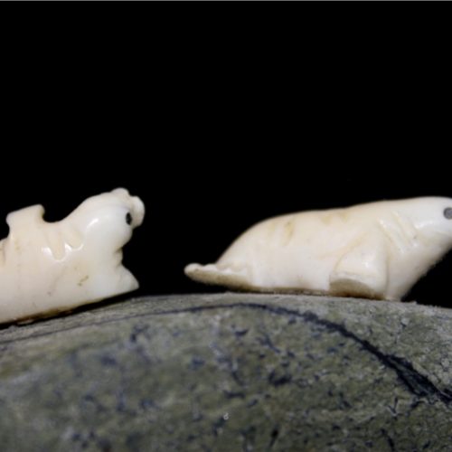 Inuit Carving of two Seals on Rock by Henry Nakoolak