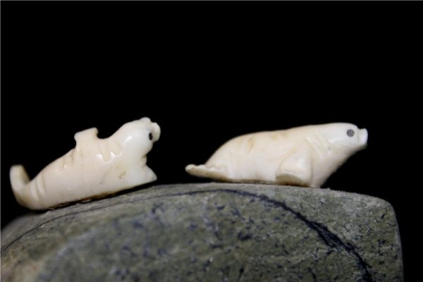 Inuit Carving of two Seals on Rock by Henry Nakoolak