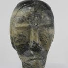 Face carved by Inuit artist Papriak Tukikie