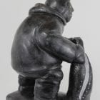 Inuit carving of Man with seal catch