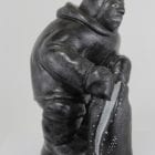 Inuit carving of Man with seal catch