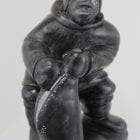 Inuit carving of Man with seal catch