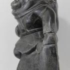 Woman carrying seals Inuit carving