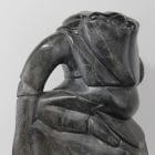 Woman carrying seals Inuit carving