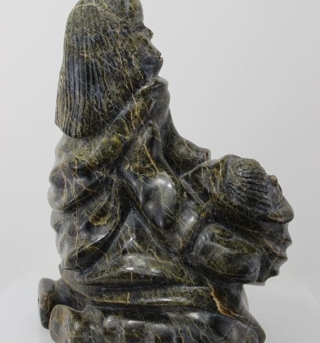 A gorgeous carving of mother and child by Palaya Qiatsuq