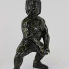 Hammer Throw, Inuit carving by well-known Isaaci Etidloie