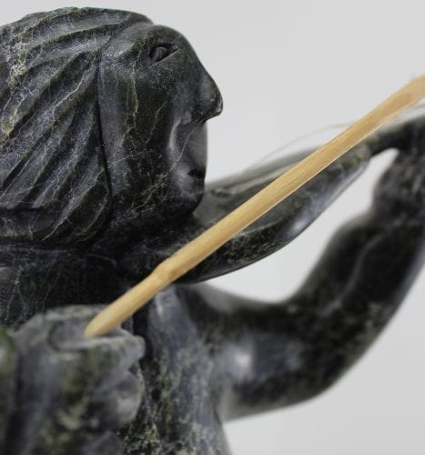 Fiddler carved by an Inuit artist from Cape Dorset