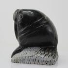 Carving of a walrus on a rock, by unknown Inuit Artist