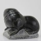 Carving of a walrus on a rock, by unknown Inuit Artist