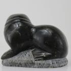 Carving of a walrus on a rock, by unknown Inuit Artist