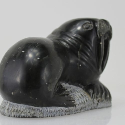Carving of a walrus on a rock, by unknown Inuit Artist