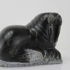 Carving of a walrus on a rock, by unknown Inuit Artist