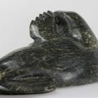 Serpentine walrus carved by Joannie Ikkiduak