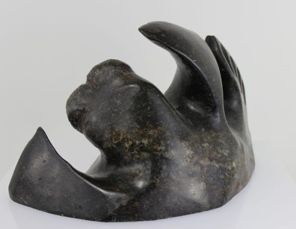 Wonderful Walrus carved by Inuit artist Willie Tertiluk