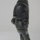 Man carrying seal, carved by Eli Surusila