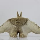 Unique face carved from whalebone by Yassie Kakee, an Inuit artist from Iqaluit