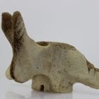 Unique face carved from whalebone by Yassie Kakee, an Inuit artist from Iqaluit