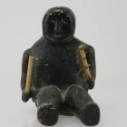 Sitting man with clubs, unknown carver, thought to be from 1960s