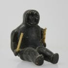 Sitting man with clubs, unknown carver, thought to be from 1960s