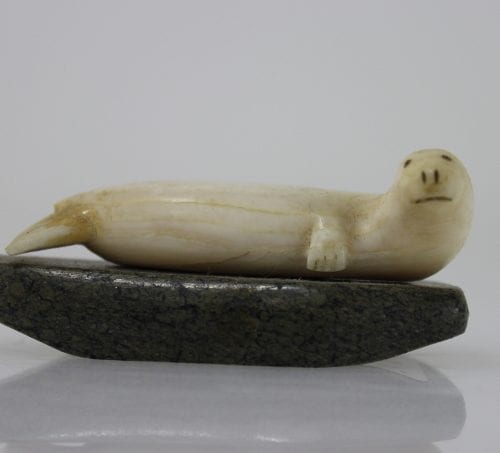 Ivory seal on stone base by unknown Inuit artist