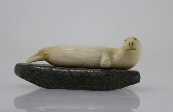 Ivory seal on stone base by unknown Inuit artist