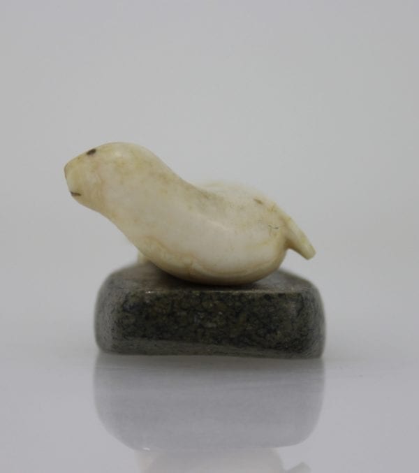 Ivory seal on stone base by unknown Inuit artist