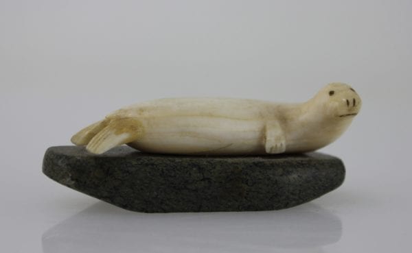 Ivory seal on stone base by unknown Inuit artist