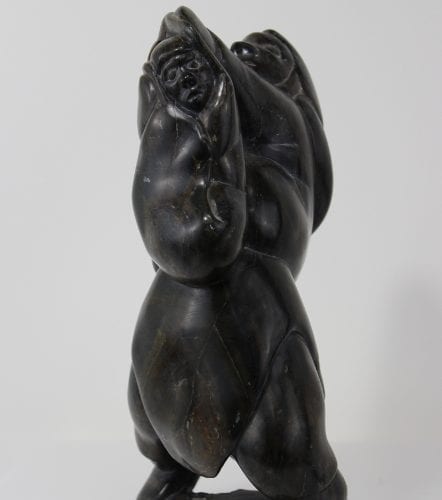 Mother and child carved by Inuit artist Thomassie Echalook