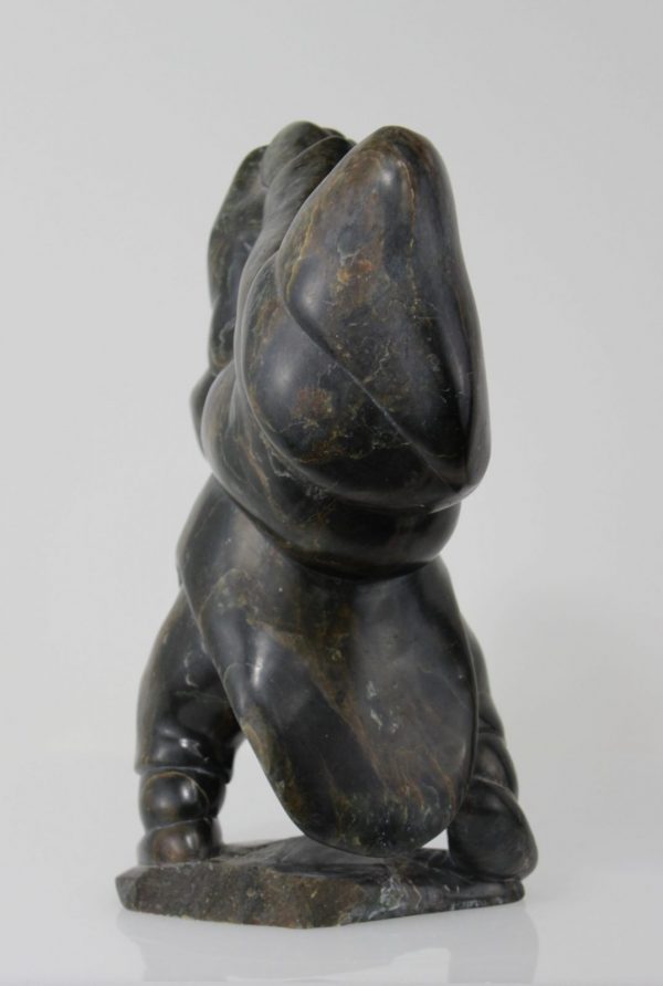 Mother and child carved by Inuit artist Thomassie Echalook