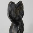 Mother and child carved by Inuit artist Thomassie Echalook