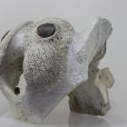 Abstract whalebone carving by an unknown Inuit artist