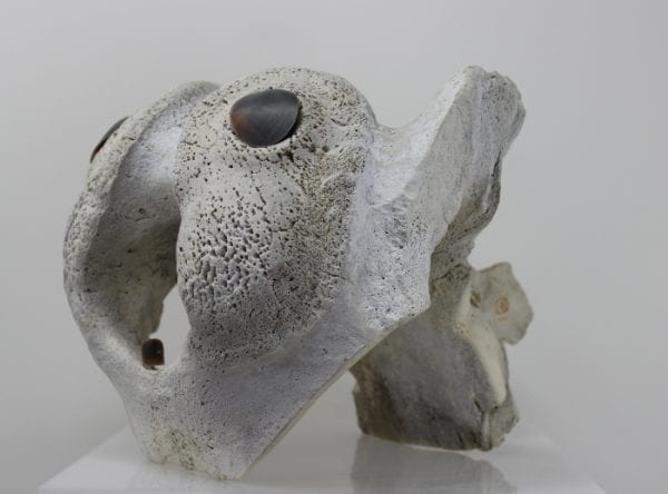 Abstract whalebone carving by an unknown Inuit artist