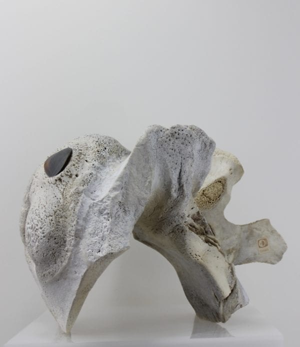 Abstract whalebone carving by an unknown Inuit artist