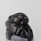 Gorgeous carving of an Inuit woman fishing by Adamie Inukpuk